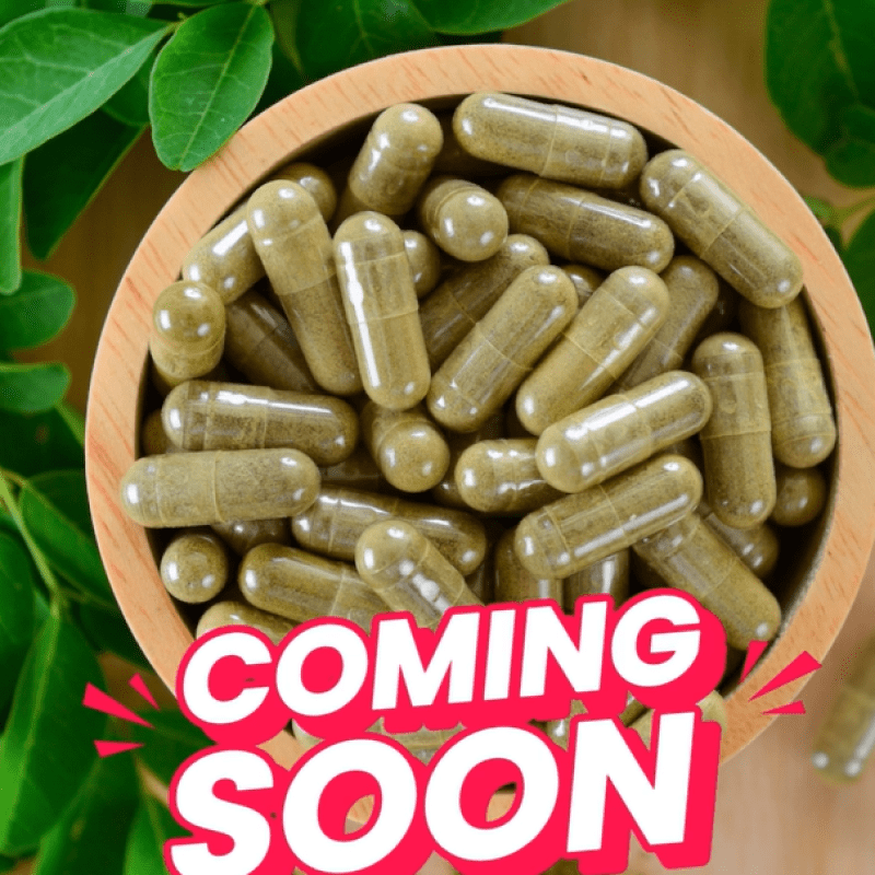 A bowl of green pills with the words " coming soon ".